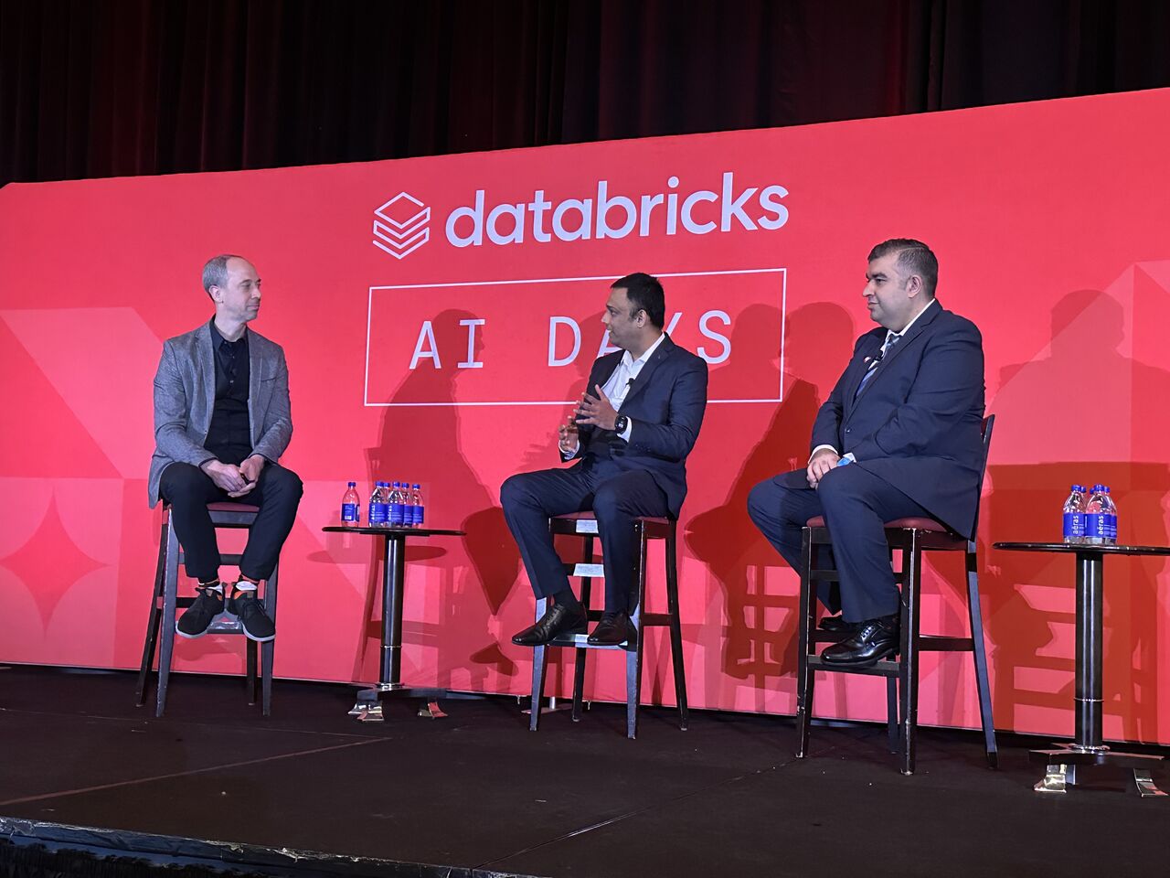 Amir Tavasoli on a Databricks AI Days panel discussion alongside two other speakers